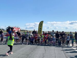 Runners Take Over Waterloo Airport Runway to Raise Funds